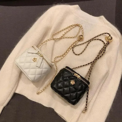 Small women's crossbody bag with a chain strap