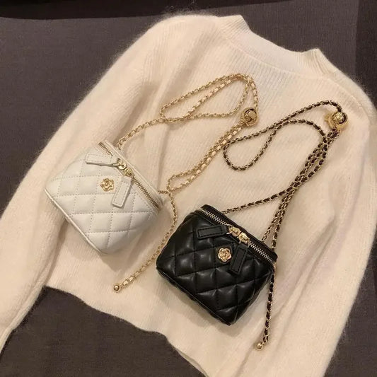 Small women's crossbody bag with a chain strap