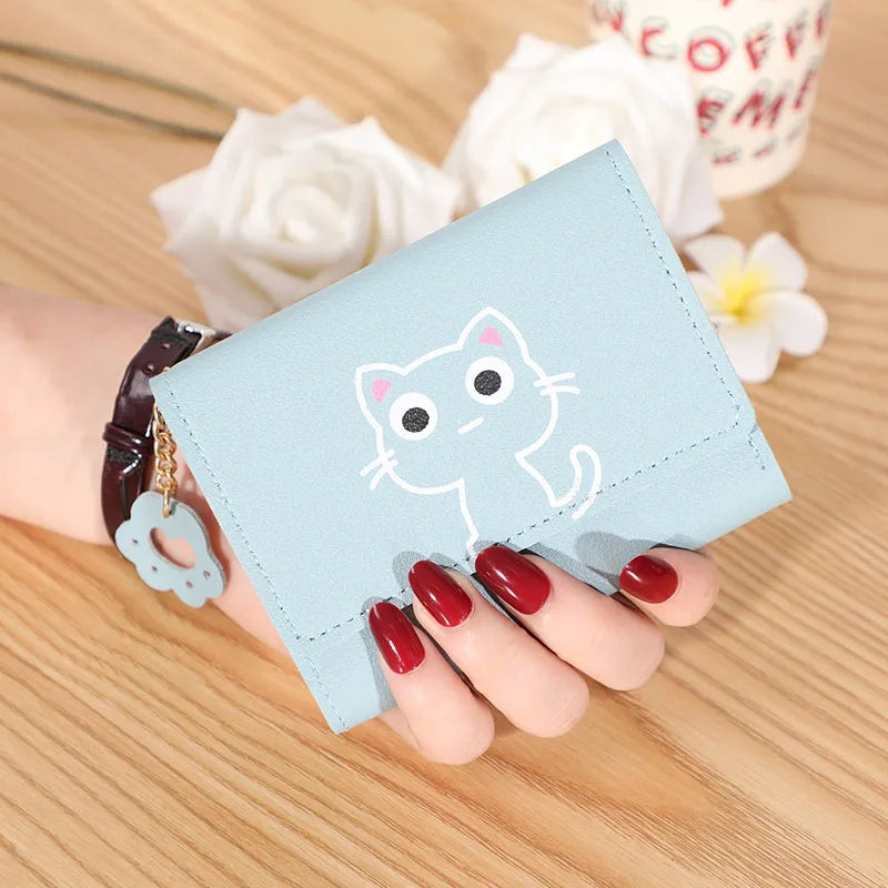 Small and compact women's wallet for girls with a cat print, featuring card slots and a bill compartment.