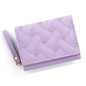 Small women's wallet in leather, elegant design, available in various colors.