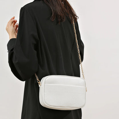 Women's leather tote bag, classic style with crossbody strap and chain detail