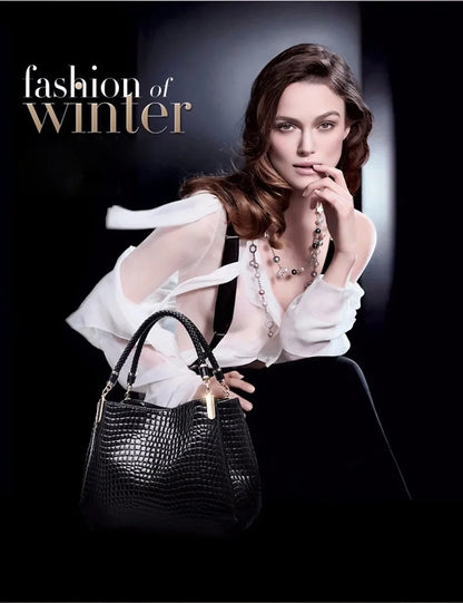 Women's satchel and tote bag with crocodile print and top handle. Stylish