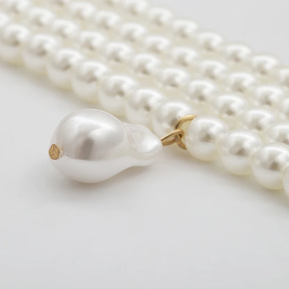 Sophisticated and elegant classic multi-strand choker necklace featuring round pearls and a pearl pendant, perfect for parties and other special occasions