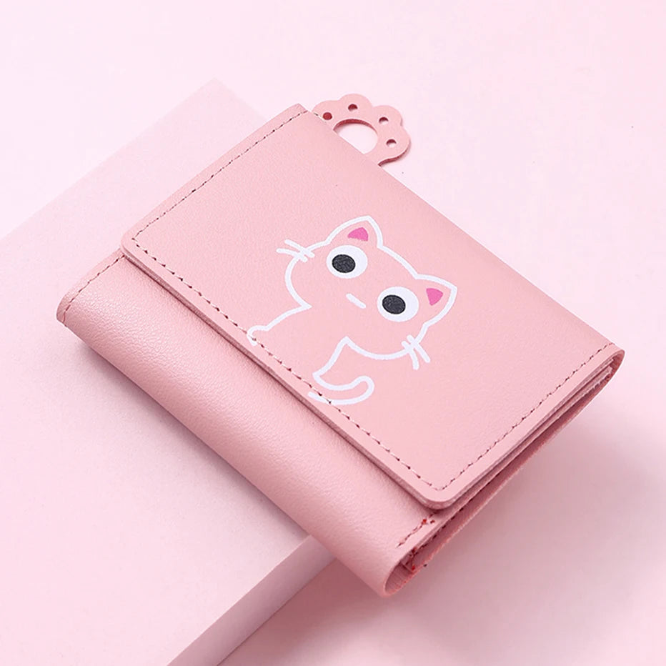 Small and compact women's wallet for girls with a cat print, featuring card slots and a bill compartment.