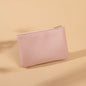 Small and elegant women's wallet with zipper closure, card holder and key holder