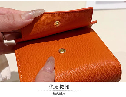 Retro women's wallet with multiple card slots, multifunctional with three folds.