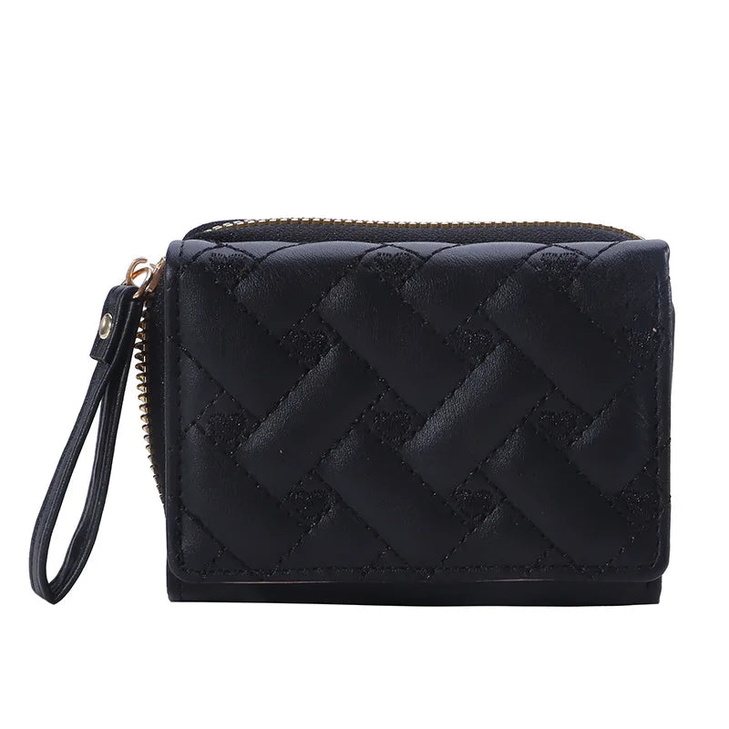 Small women's wallet in leather, elegant design, available in various colors.