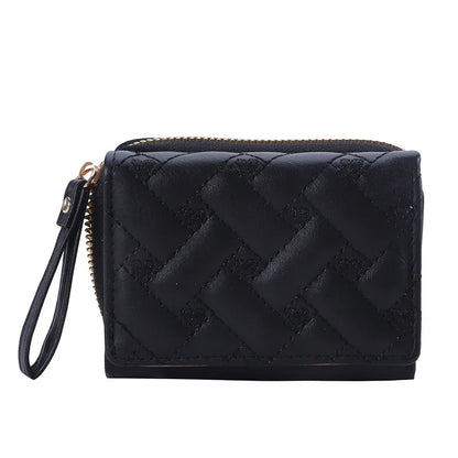 Small women's wallet in leather, elegant design, available in various colors.