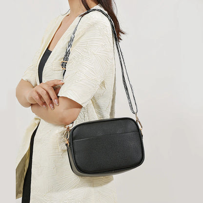 Women's leather tote bag, classic style with crossbody strap and chain detail