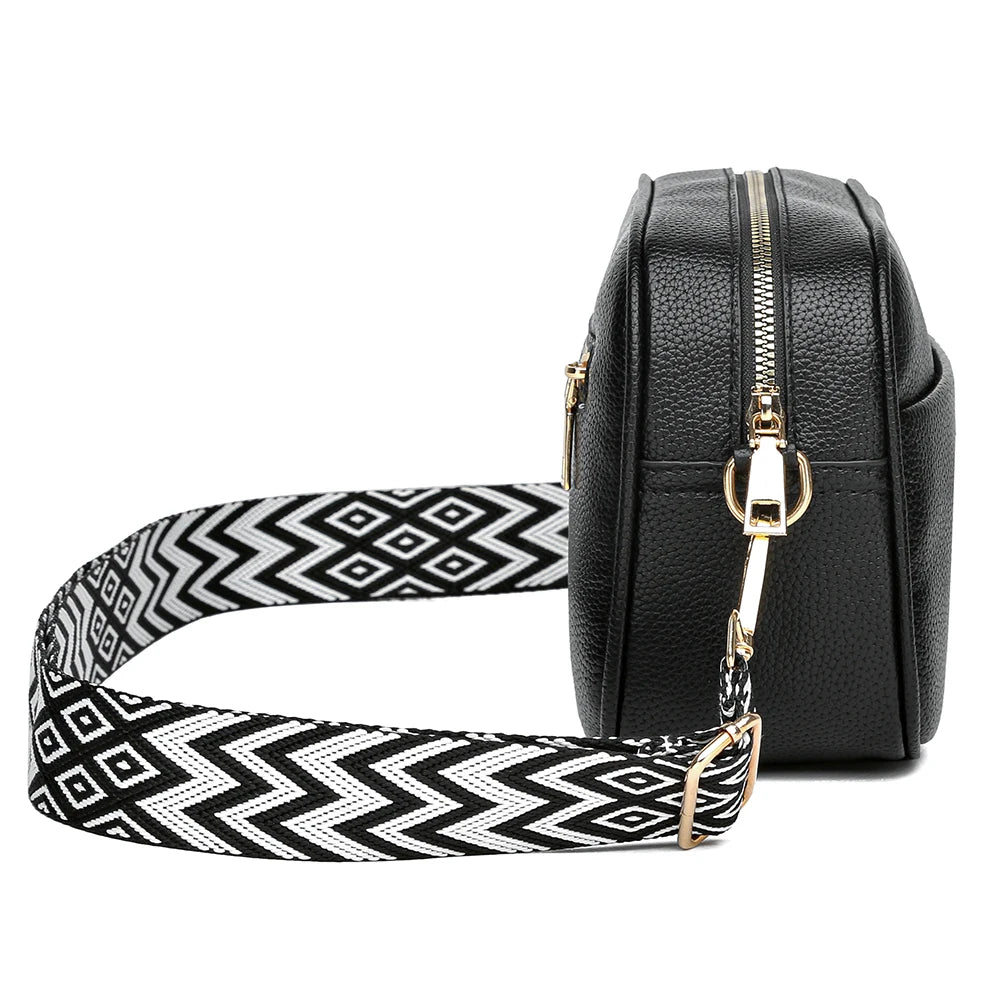 Women's leather tote bag, classic style with crossbody strap and chain detail
