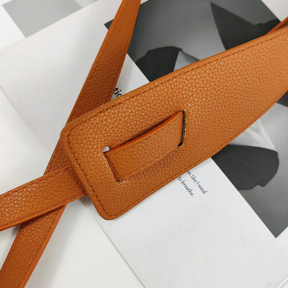 High-quality women's belt in soft leather with a knot, long and wide band, ideal for wearing with coats and dresses