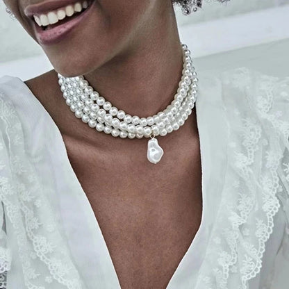 Sophisticated and elegant classic multi-strand choker necklace featuring round pearls and a pearl pendant, perfect for parties and other special occasions