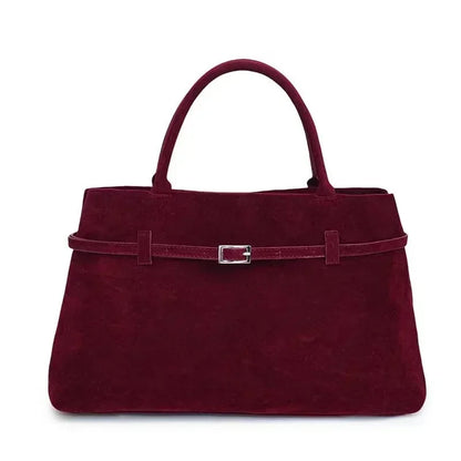 Women's handbag made of synthetic suede with a decorative buckle, large capacity, and snap closure