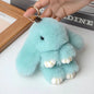 Adorable and fun women's keychain with a rabbit fur pendant.