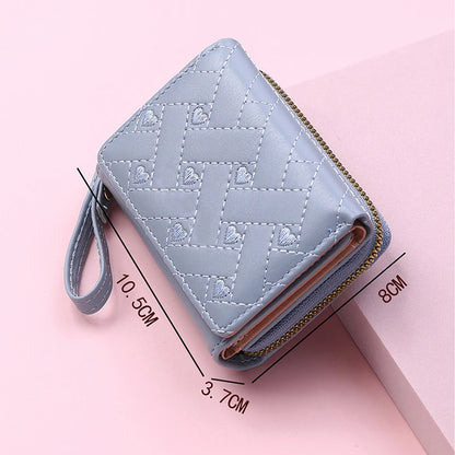 Small women's wallet in leather, elegant design, available in various colors.