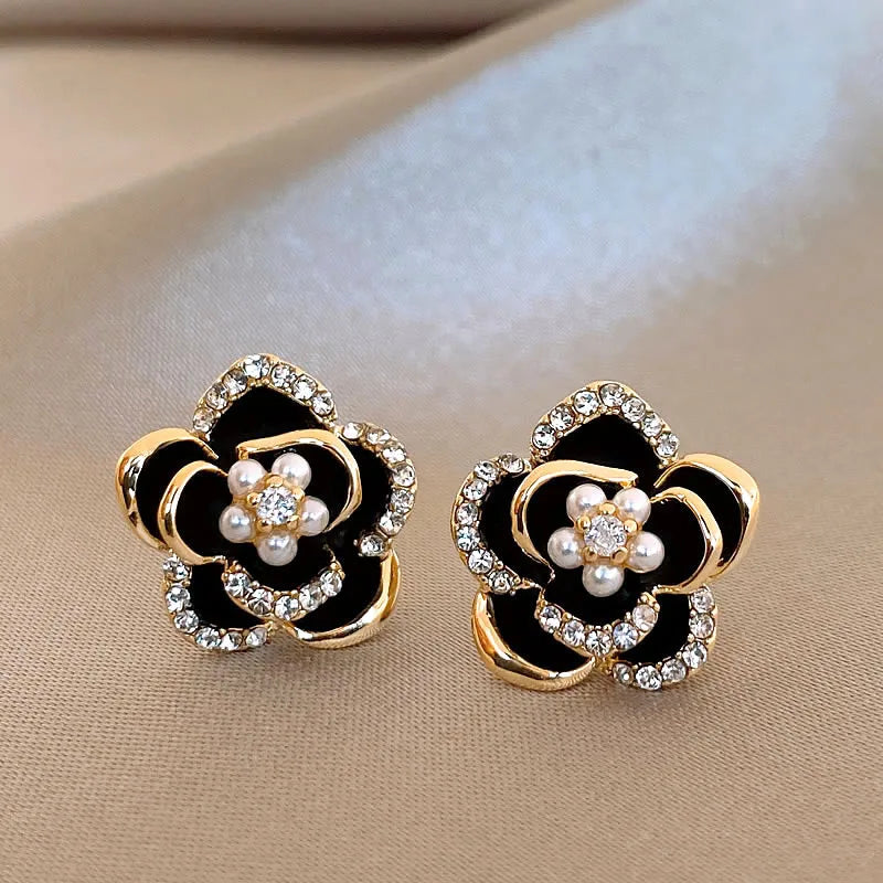 Black Camellia earrings with embedded cubic zirconia and rhinestones, modern and delicate