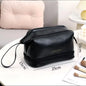 A sophisticated, portable, and large toiletry bag for cosmetics or personal hygiene items.
