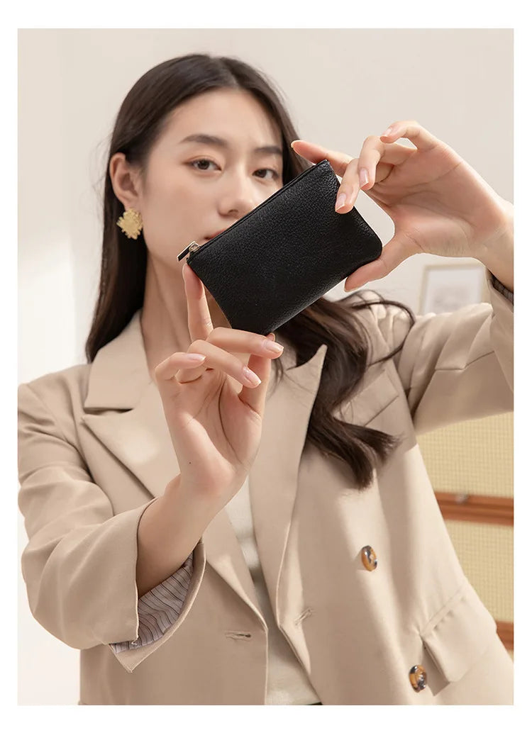 Small and elegant women's wallet with zipper closure, card holder and key holder