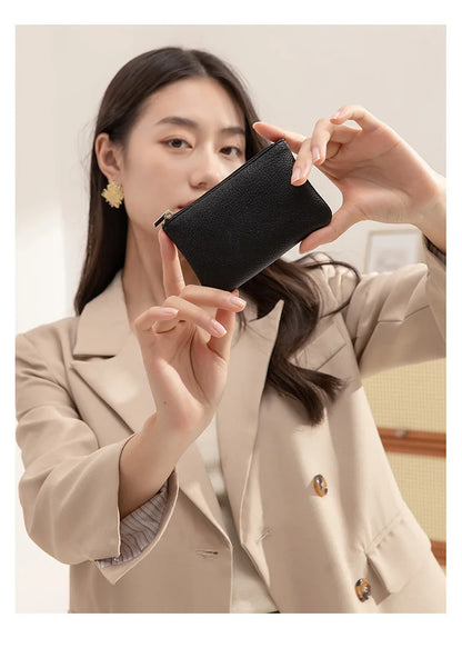 Small and elegant women's wallet with zipper closure, card holder and key holder