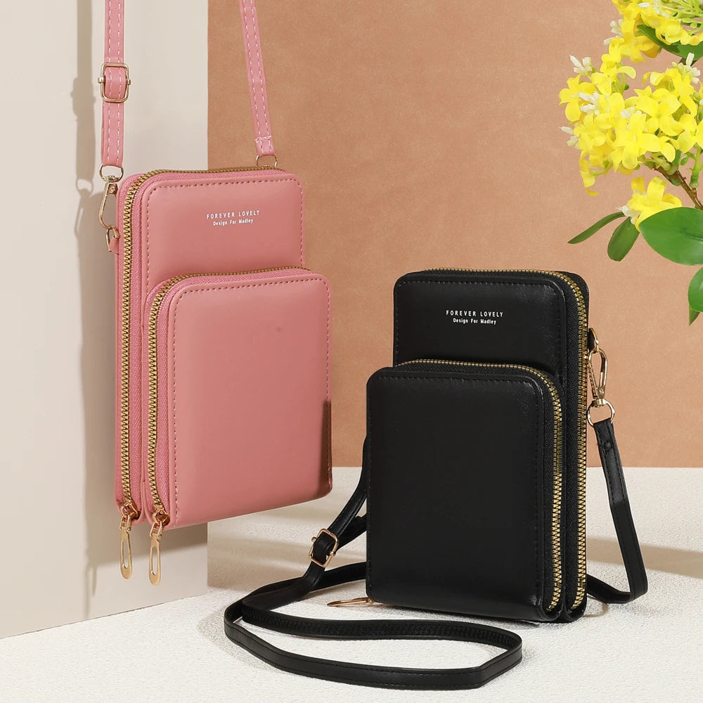 Modern, compact, and secure women's cell phone bag. Holds phones, cards, and documents