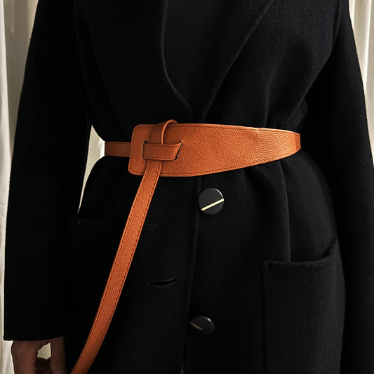 High-quality women's belt in soft leather with a knot, long and wide band, ideal for wearing with coats and dresses