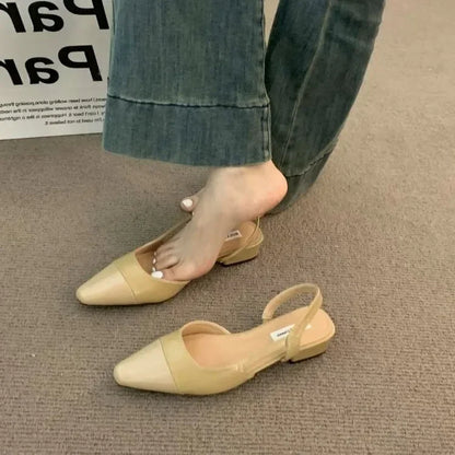 Women's low-heeled shoe with a pointed toe, chunky heel, and comfortable fit