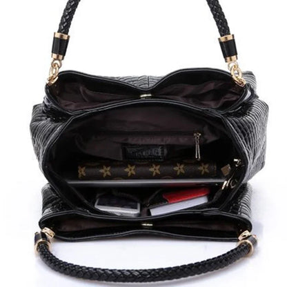 Women's satchel and tote bag with crocodile print and top handle. Stylish