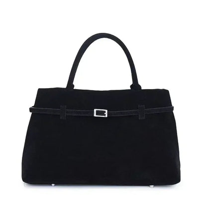 Women's handbag made of synthetic suede with a decorative buckle, large capacity, and snap closure