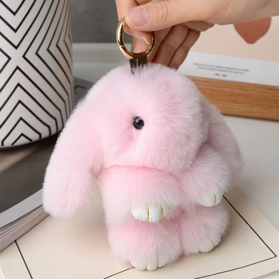 Adorable and fun women's keychain with a rabbit fur pendant.