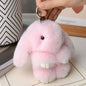Adorable and fun women's keychain with a rabbit fur pendant.