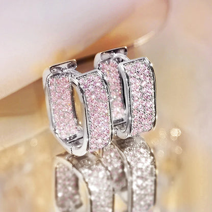 Women's silver or gold hoop earrings set with cubic zirconia