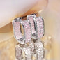 Women's silver or gold hoop earrings set with cubic zirconia