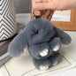 Adorable and fun women's keychain with a rabbit fur pendant.