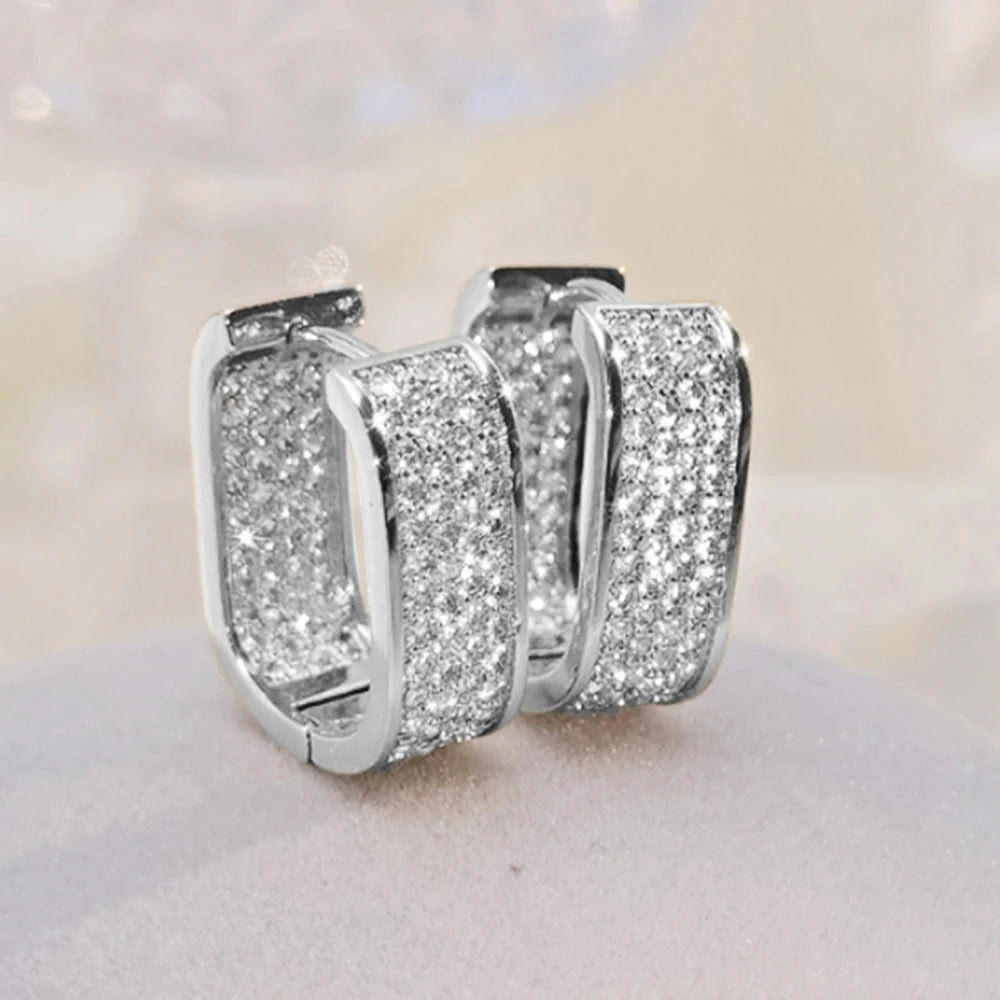 Women's silver or gold hoop earrings set with cubic zirconia