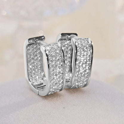 Women's silver or gold hoop earrings set with cubic zirconia