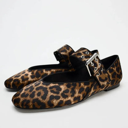 Women's flat, pointed-toe, moccasin-style shoes with a print