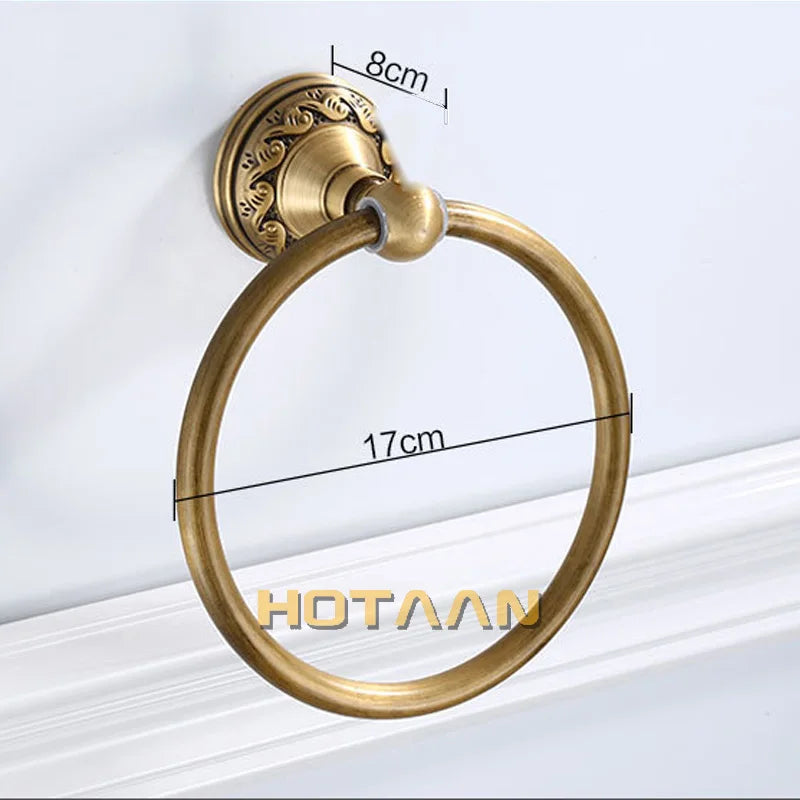 Round aluminum wall-mounted towel rack for bathrooms, with an antique brass finish.