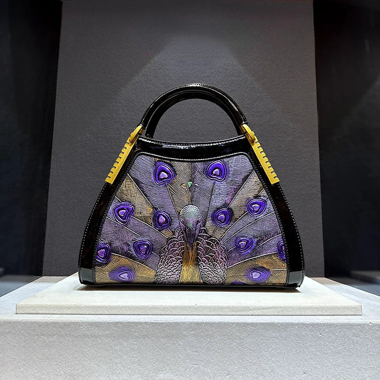 On sale! Women's handbag in high-quality cowhide leather with a peacock print. Shoulder strap is adjustable