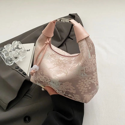 Women's embroidered handbag with zipper, made of silky fabric, adjustable strap