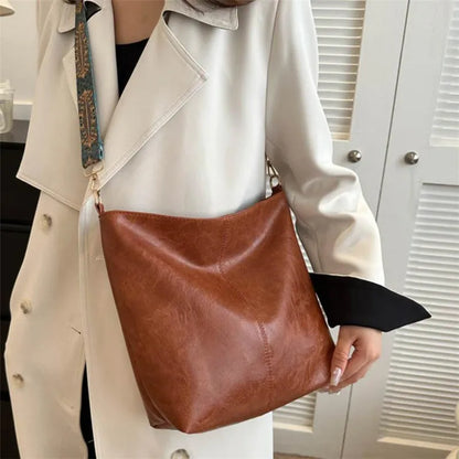 Women's bohemian-style handbag with vintage embroidery and a wide strap