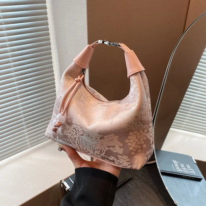 Women's embroidered handbag with zipper, made of silky fabric, adjustable strap
