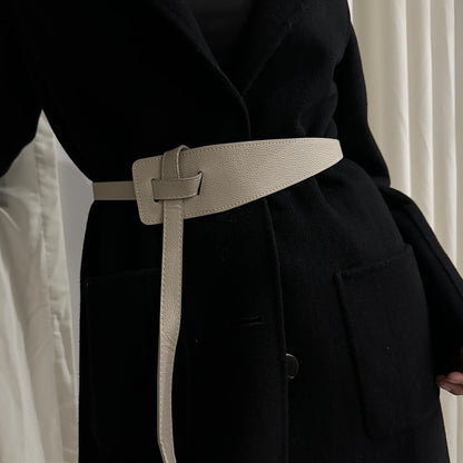 High-quality women's belt in soft leather with a knot, long and wide band, ideal for wearing with coats and dresses