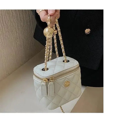 Small women's crossbody bag with a chain strap