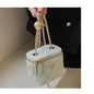 Small women's crossbody bag with a chain strap