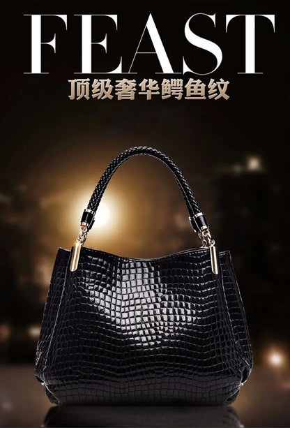 Women's satchel and tote bag with crocodile print and top handle. Stylish