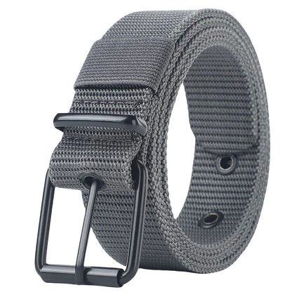 Unisex canvas belt with pin buckle and leather detail. Modern with eyelets and perfect for wearing with jeans.