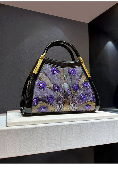 On sale! Women's handbag in high-quality cowhide leather with a peacock print. Shoulder strap is adjustable