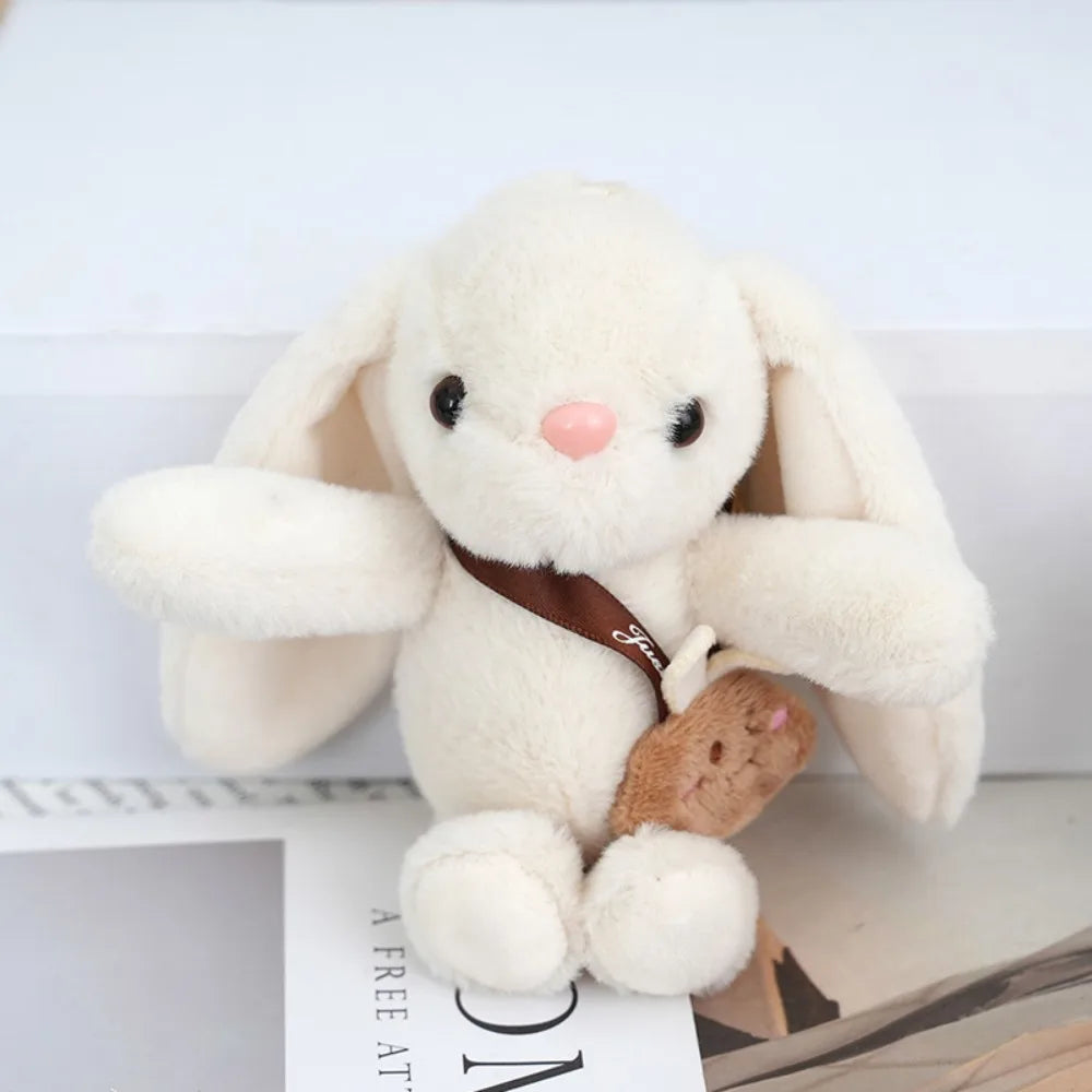 Adorable and fun women's keychain with a rabbit fur pendant.
