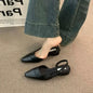 Women's low-heeled shoe with a pointed toe, chunky heel, and comfortable fit