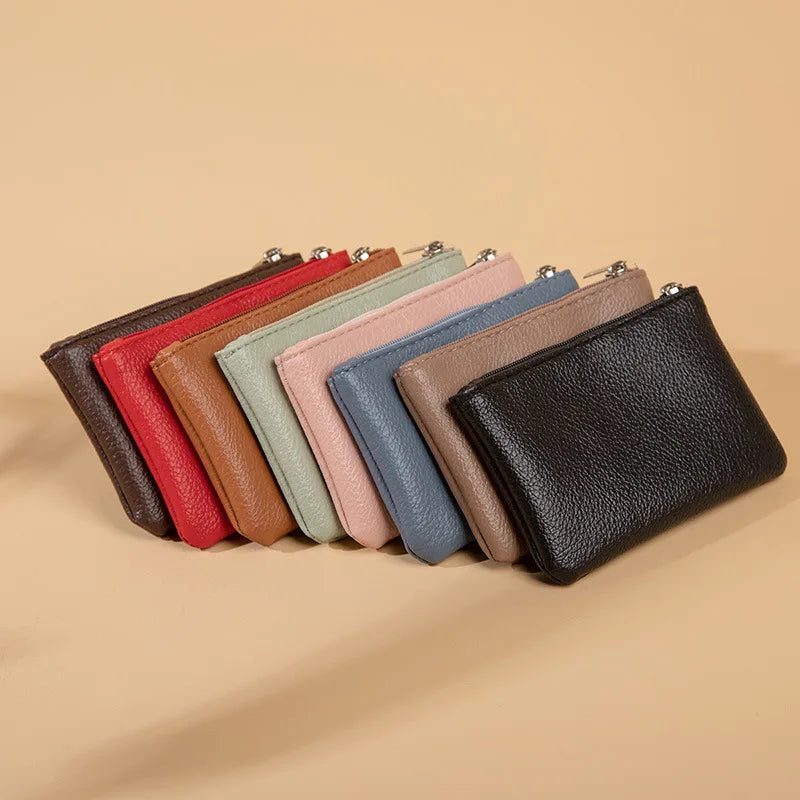 Small and elegant women's wallet with zipper closure, card holder and key holder